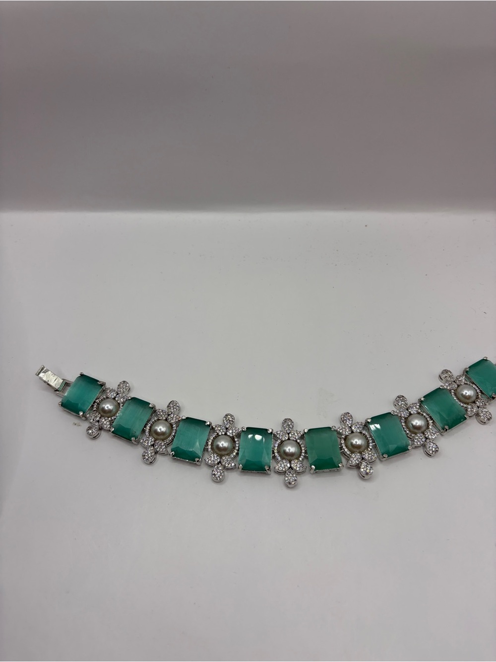 Stainless Emerald Green Doublet Stone With American Diamond Pearl Bracelet